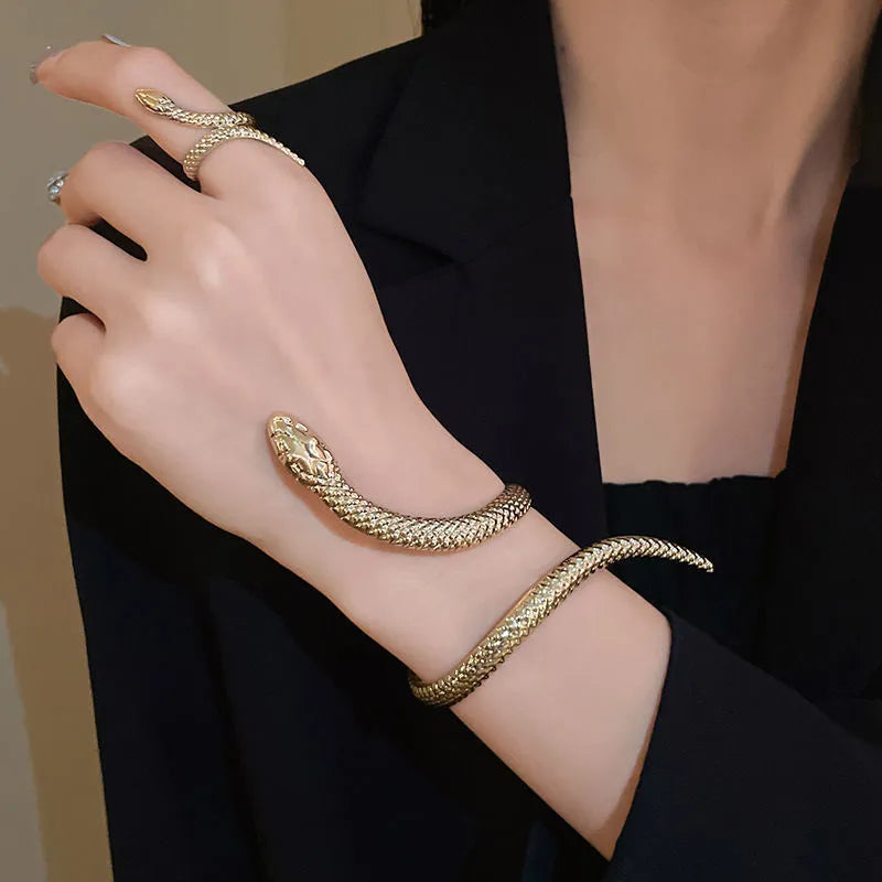 Gold and silver exaggerated twisted snake design metal ring and bracelet jewellery set