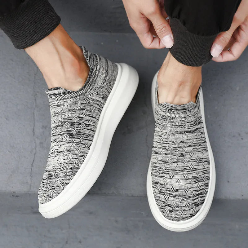 Men's mesh casual breathable solid colour sneakers shown in black colourway