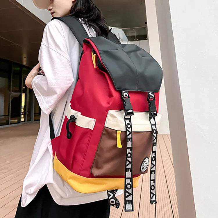 Oxford cloth backpack in black shown with handheld grip and shoulder straps.