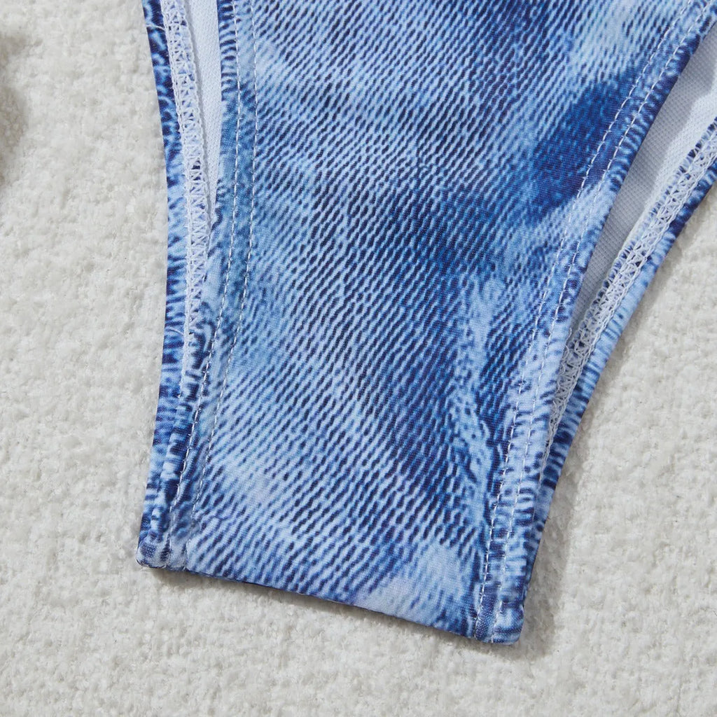 Denim blue printed bikini top and bottom set for women on a mannequin.