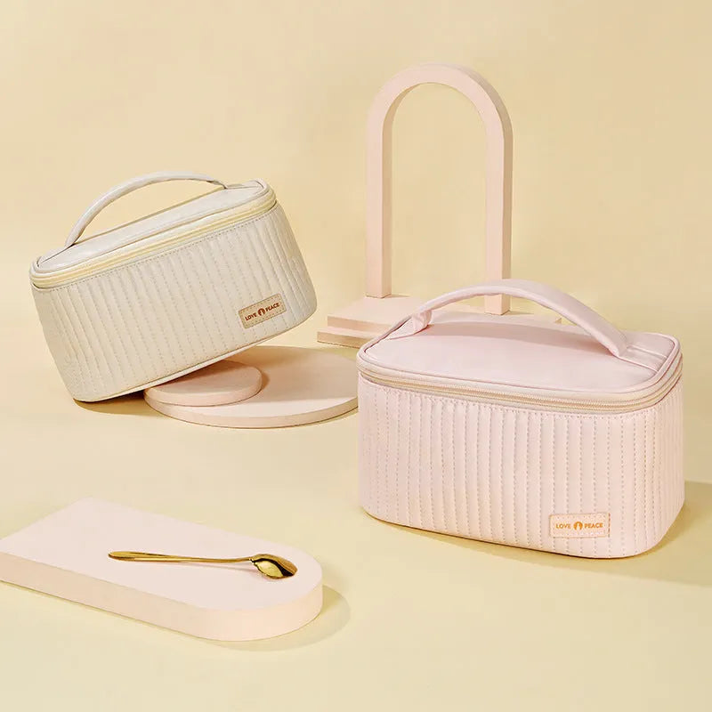 Open-top round women's makeup bag in solid colour PU leather.