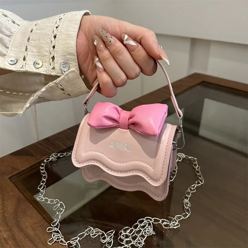 Mini crossbody bag in seven colour options with single shoulder strap