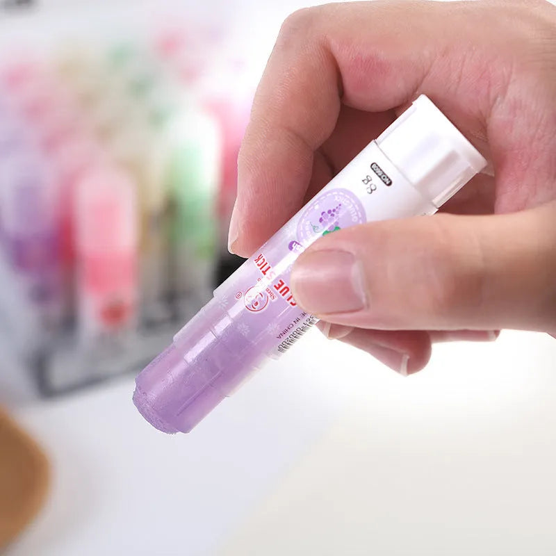 Jelly colour solid glue with fruit fragrance measuring 8.5cm by 2cm for student projects