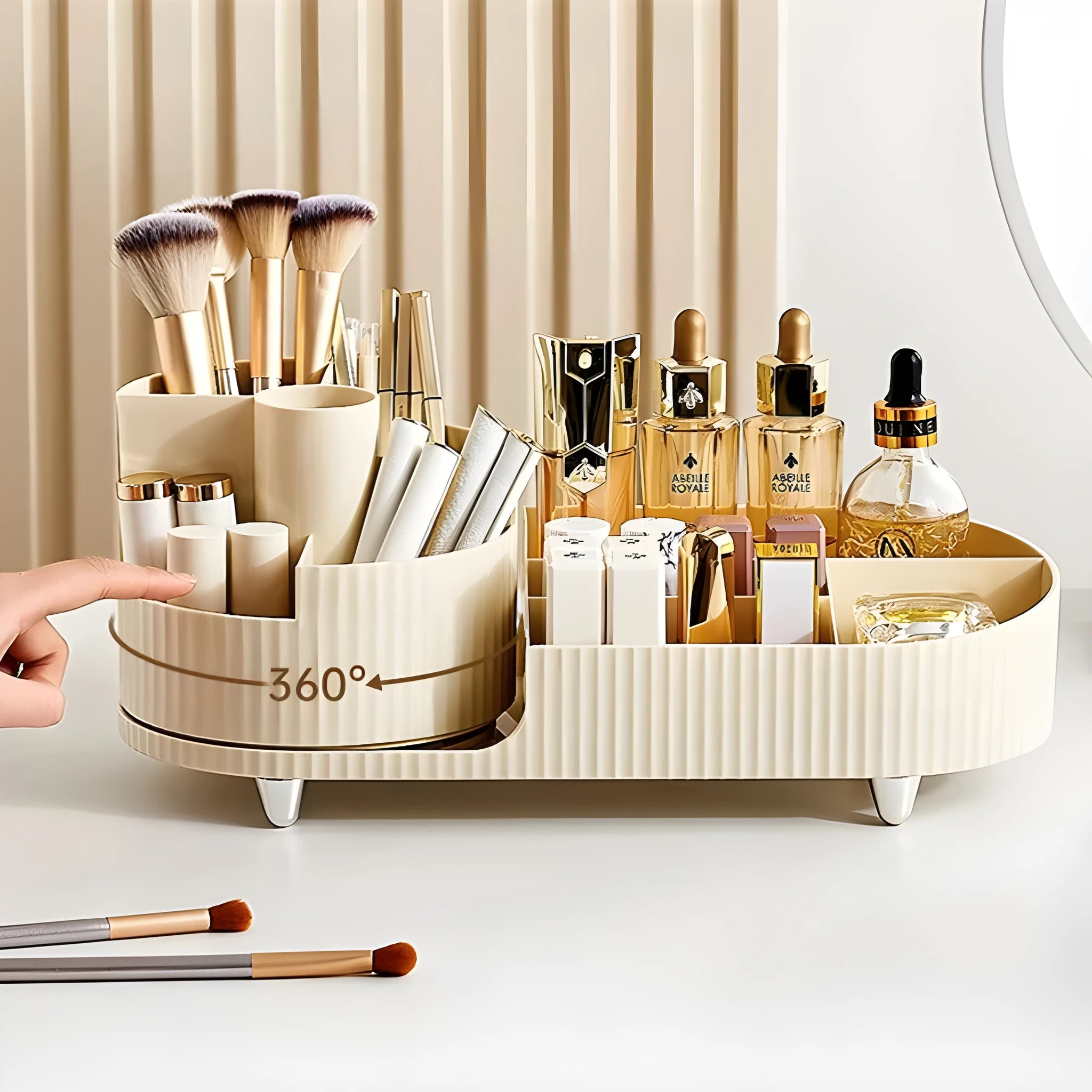 Rotating cosmetics storage box with makeup brushes and lipsticks organised on dresser table