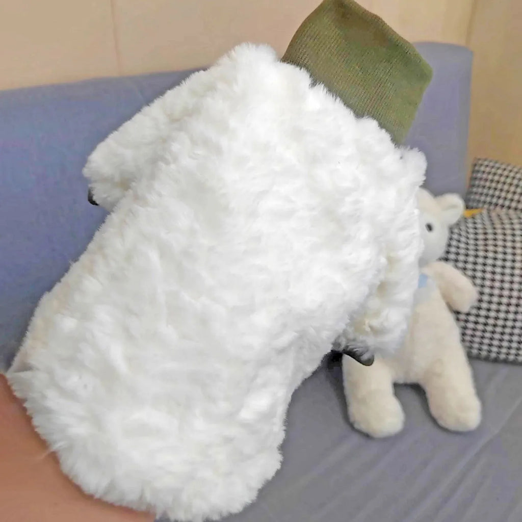 Creamy green turtleneck dog winter coat with thick plush padding on mannequin