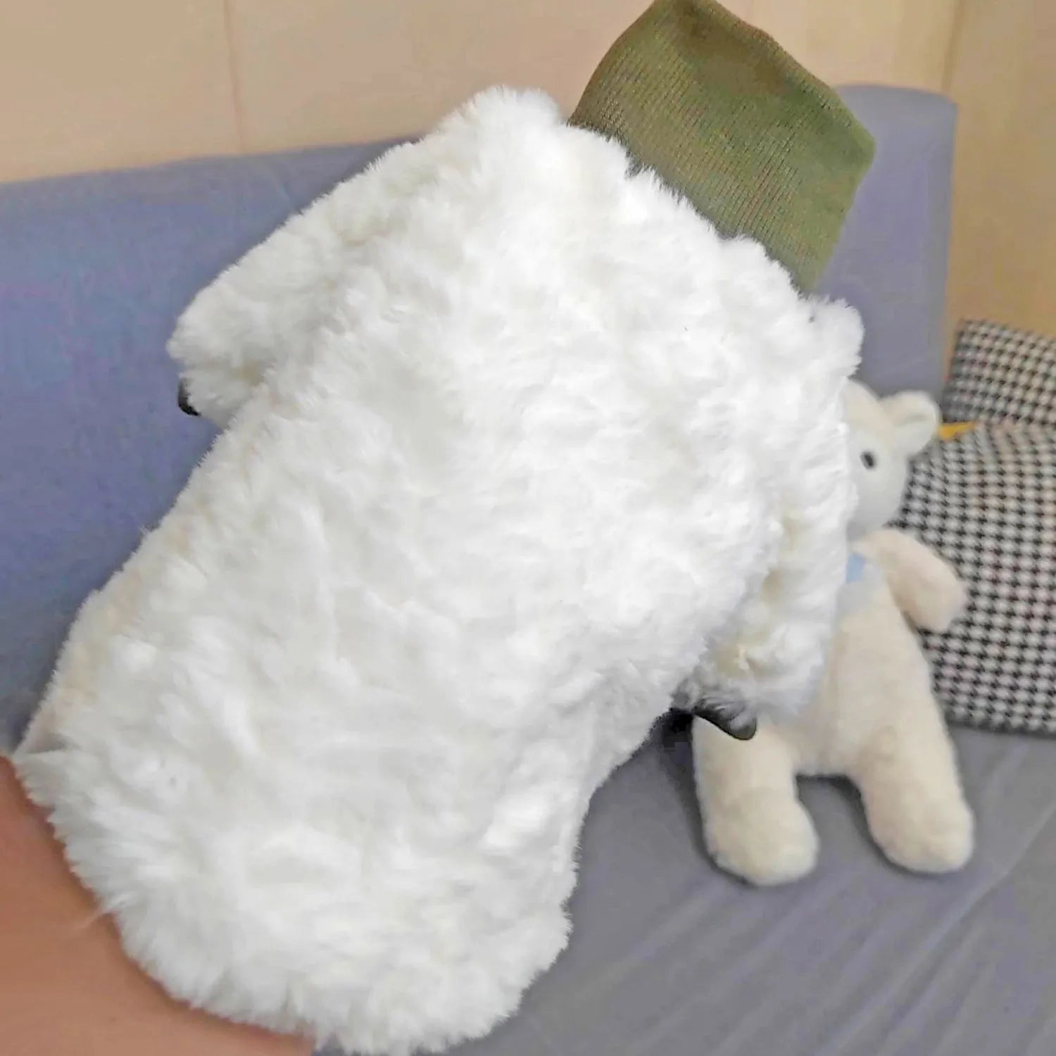Creamy green turtleneck dog winter coat with thick plush padding on mannequin