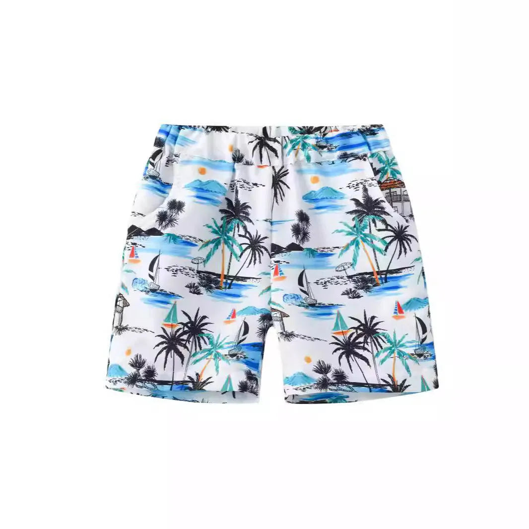 Printed beach shorts with elastic waistband in multiple colour patterns including coconut trees and pineapple design