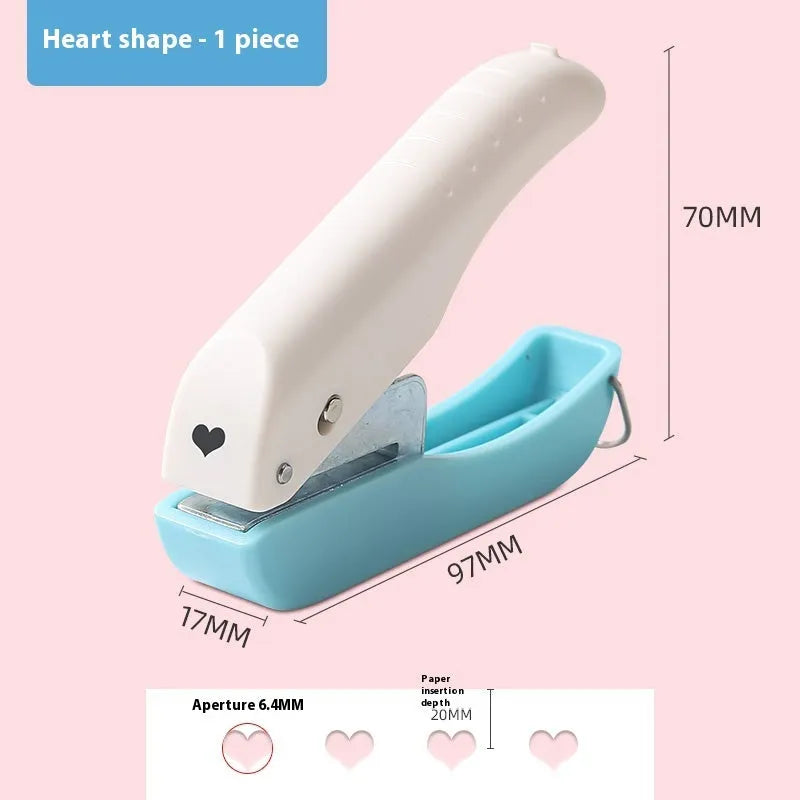 Manual hand-held punching machine for paper crafts with love, star, and round shape patterns.