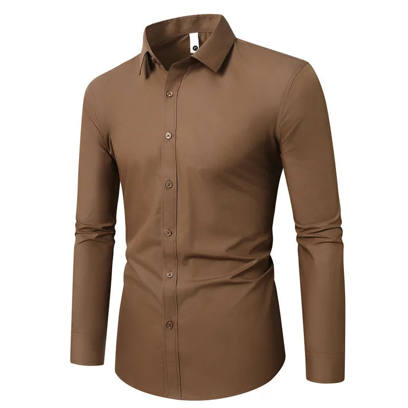 Man wearing a loose-fit long-sleeve linen shirt in a neutral colour, showcasing the casual style.