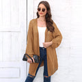 Women's loose longline acrylic cardigan sweater coat in a solid colour.