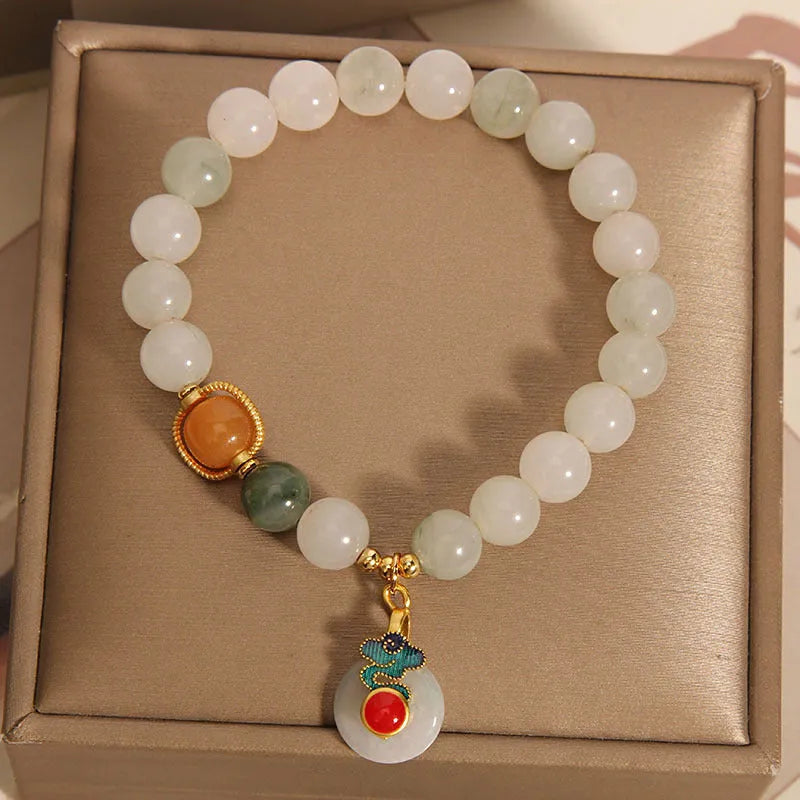 Women's jade crystal bracelet with ice jade colour, xiangyun patterns and pearl decorative elements