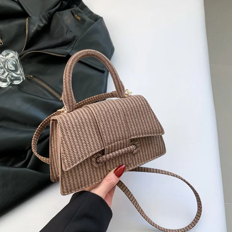 Women's PU leather crossbody messenger bag in black with sandwich pocket and sewing line detail
