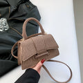 Women's PU leather crossbody messenger bag in black with sandwich pocket and sewing line detail