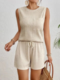 Women's apricot vest and shorts set with sleeveless round neck design on hanger