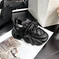 Women's milky white wedge sneakers with lace-up front and a thick platform sole.