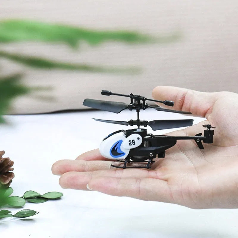 Mini helicopter remote control 35 channel crash-resistant pocket fingertip flyer model in white, yellow, and red