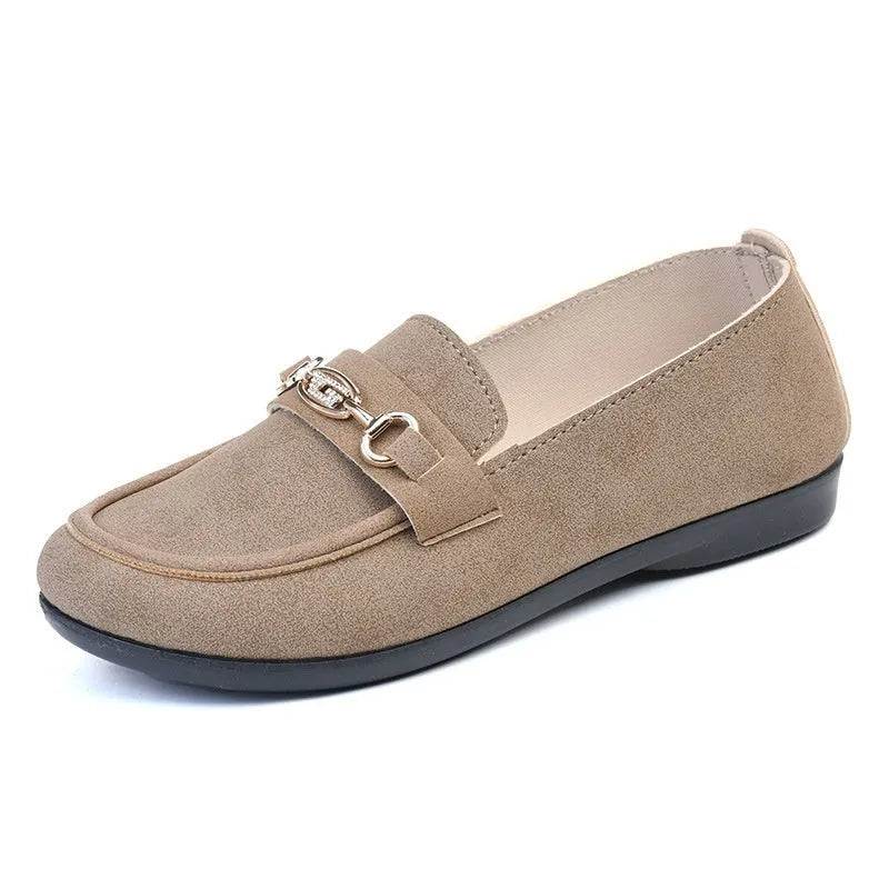 Gommino women's casual slip-on shoes in black with soft rubber sole and round toe