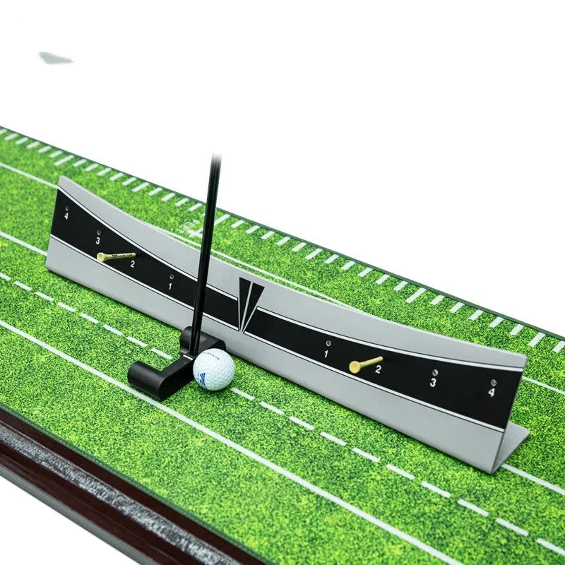 Golf putter resting against the adjustable PVC push rod balancer of the trajectory balance simulator on a carpet.