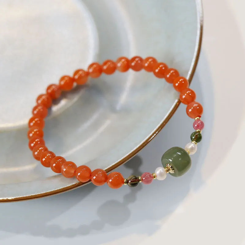 Round bead bracelet made from deep cherry red Southern Red Agate with ethnic retro style