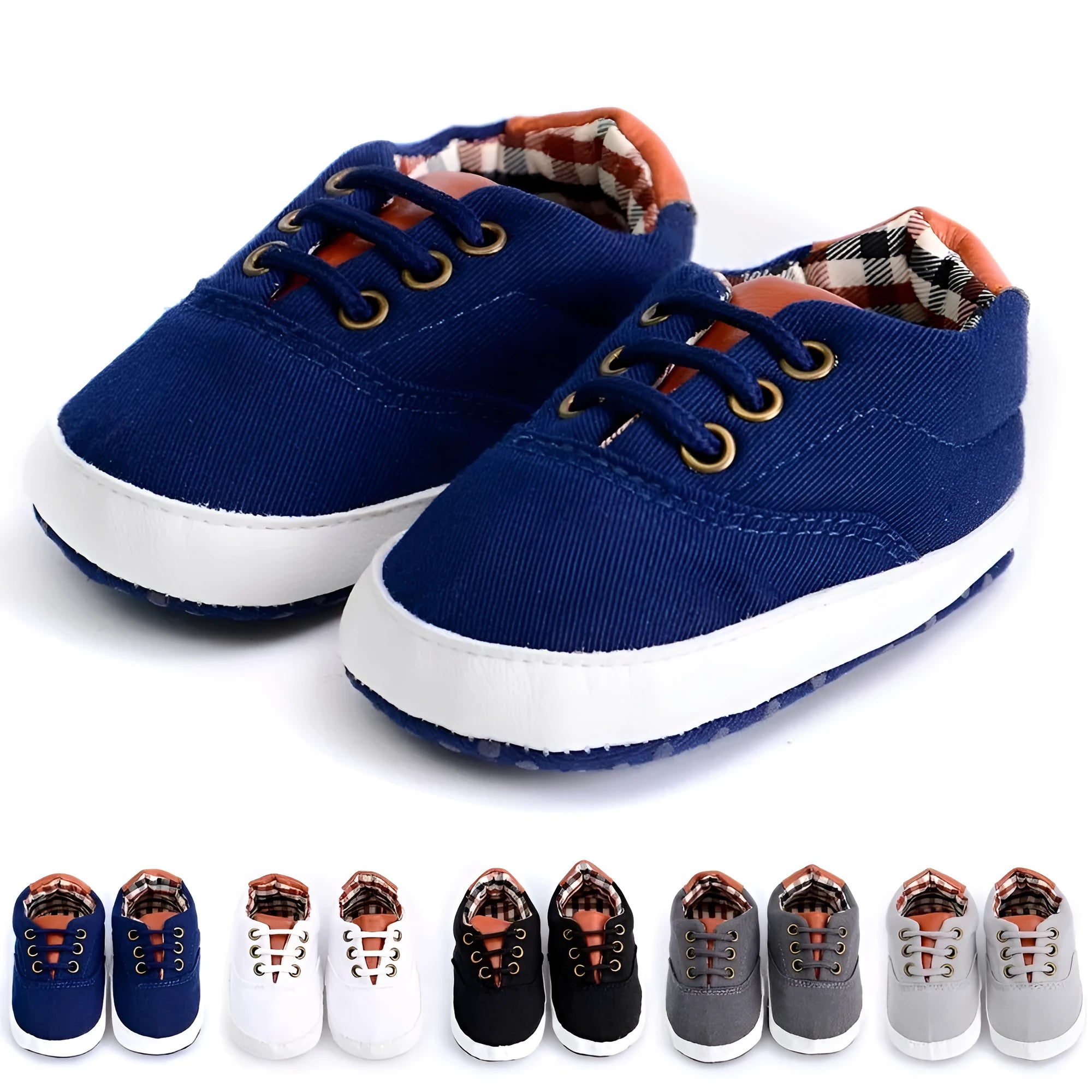 Solid colour baby canvas shoes with a front strap, shown in light grey on a white background.