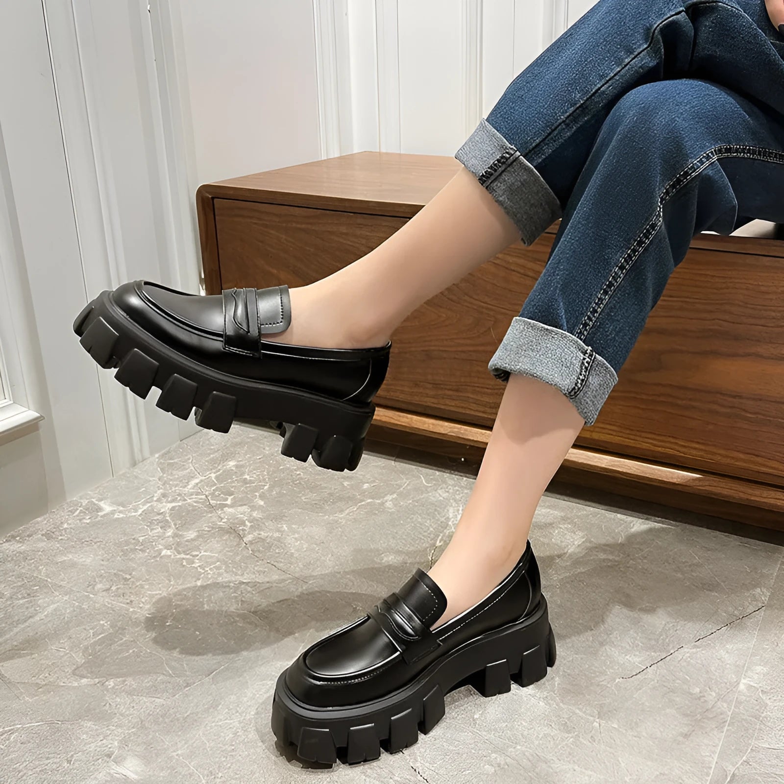 British style wide fit patent leather loafers with a rubber sole and muffin heel base.