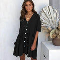 White polyester lace sleeveless maternity dress on a hanger