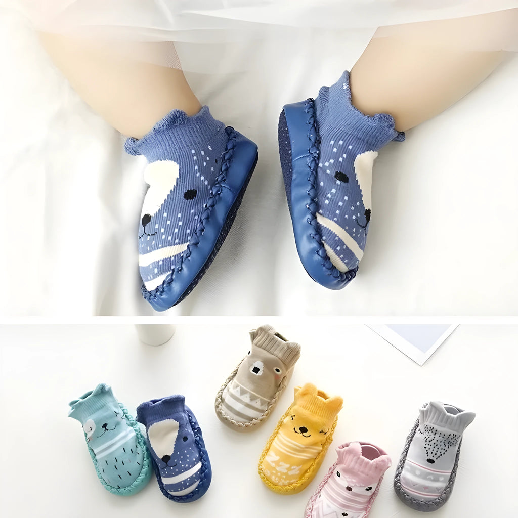 Pair of pastel coloured baby socks with anti-slip dots on the sole, shown flat.