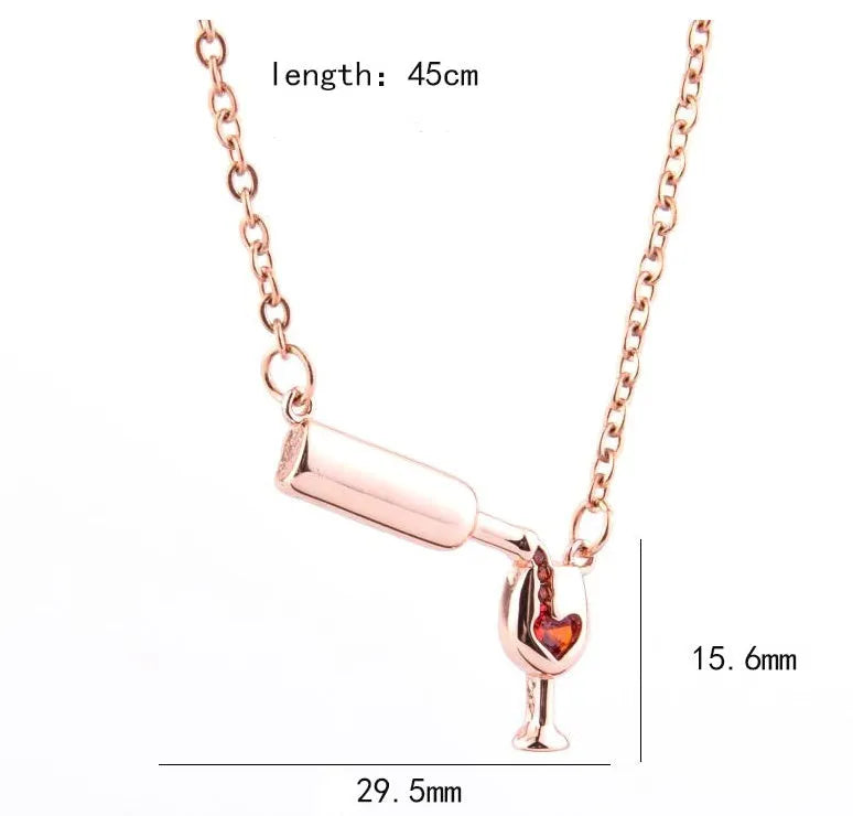 Wine bottle and cup pendant necklace with red enamel heart on gold chain