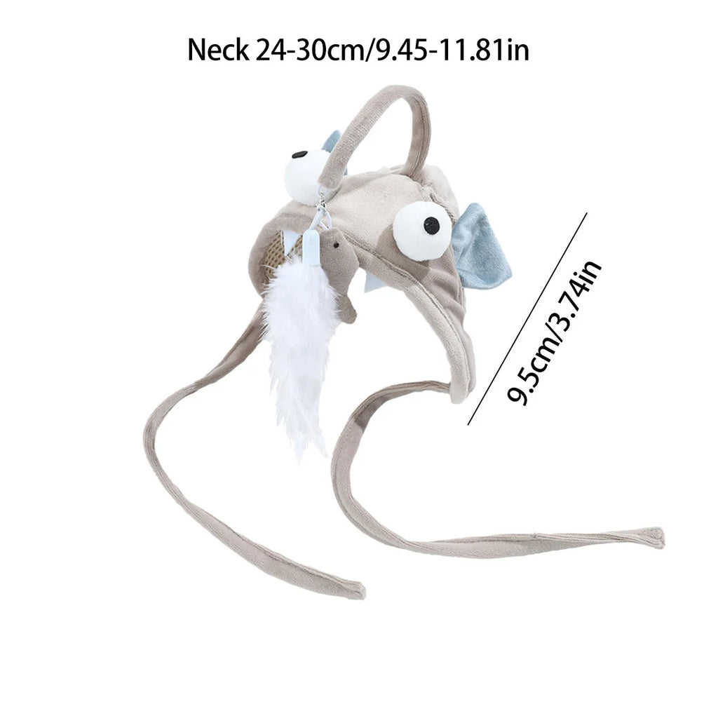 Grey dinosaur-themed head-mounted cat toy with feathers and big eye fish design on adjustable band