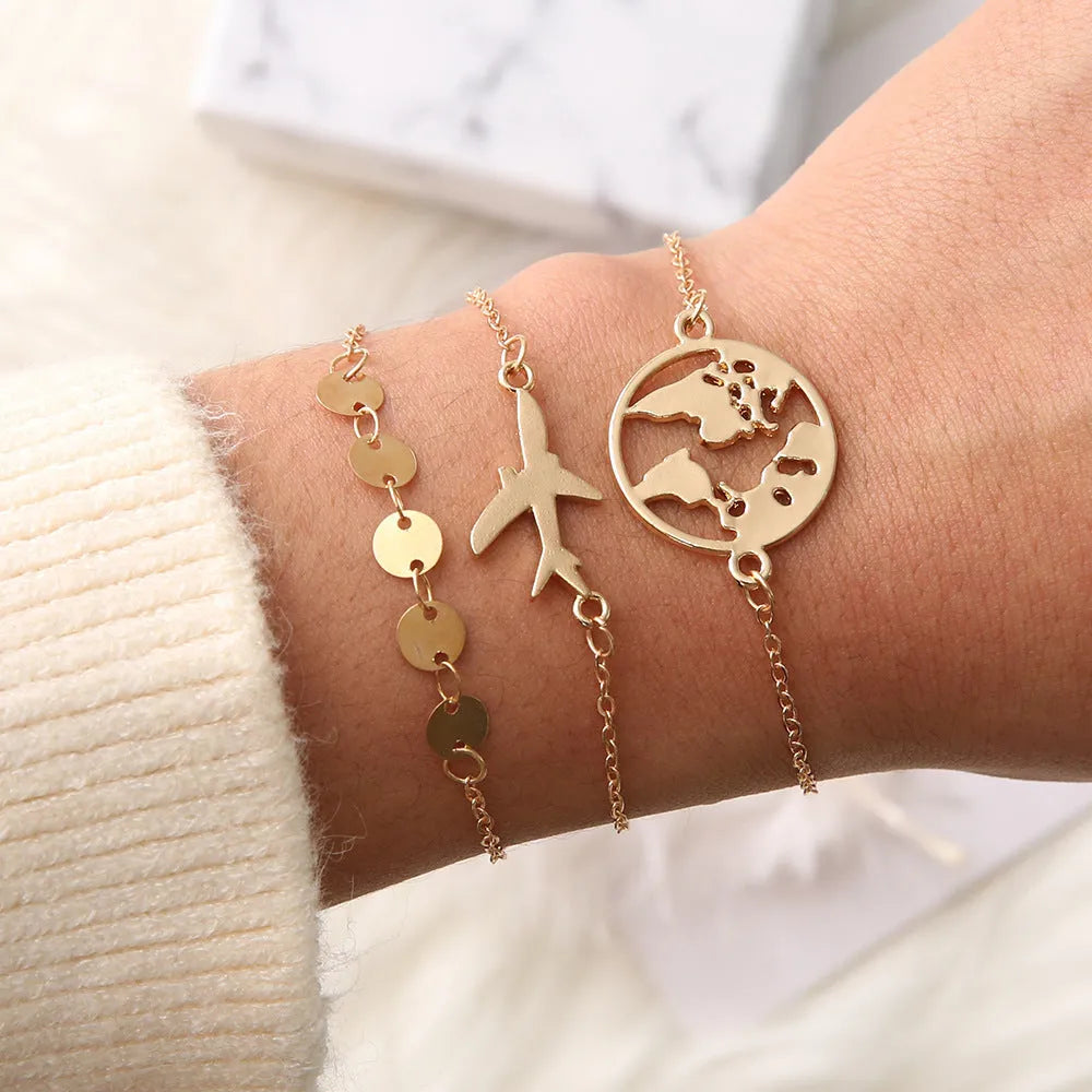 Women's three-piece bohemian charm bracelet set with aircraft map designs on heart-shaped alloy charms