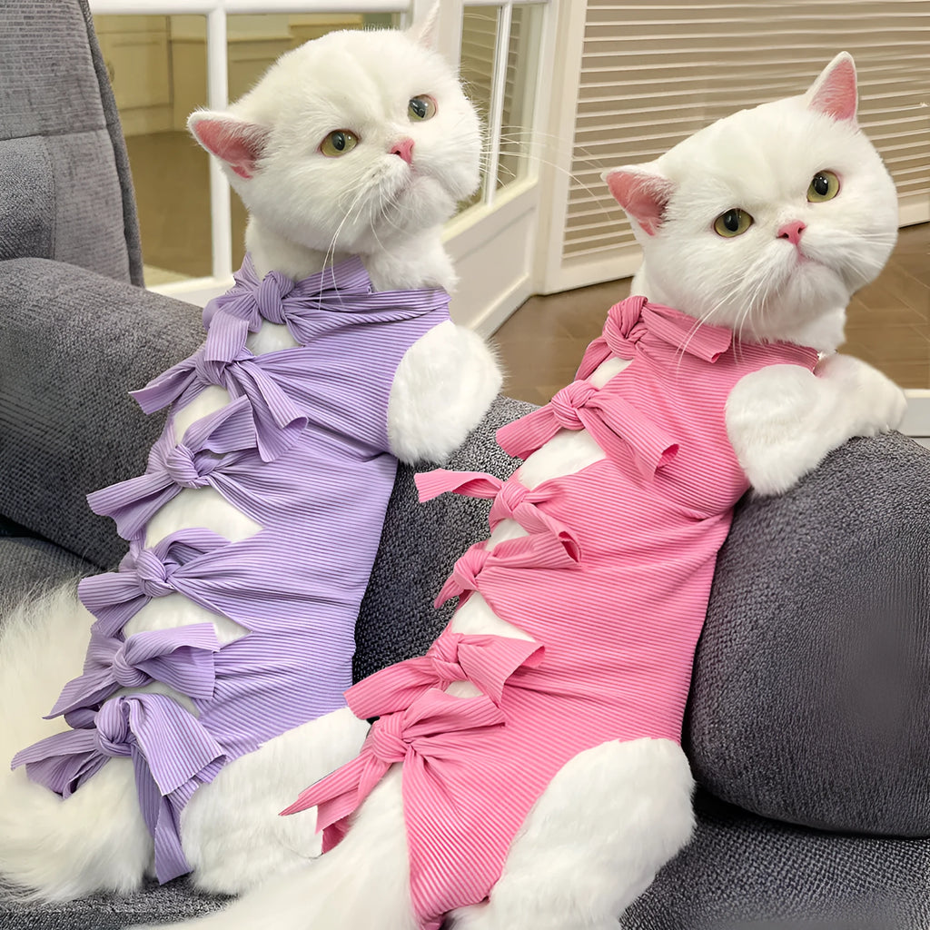 Lace-up cat recovery suit in blue, shown on a cat, featuring a full-body wrap design and adjustable back lacing.