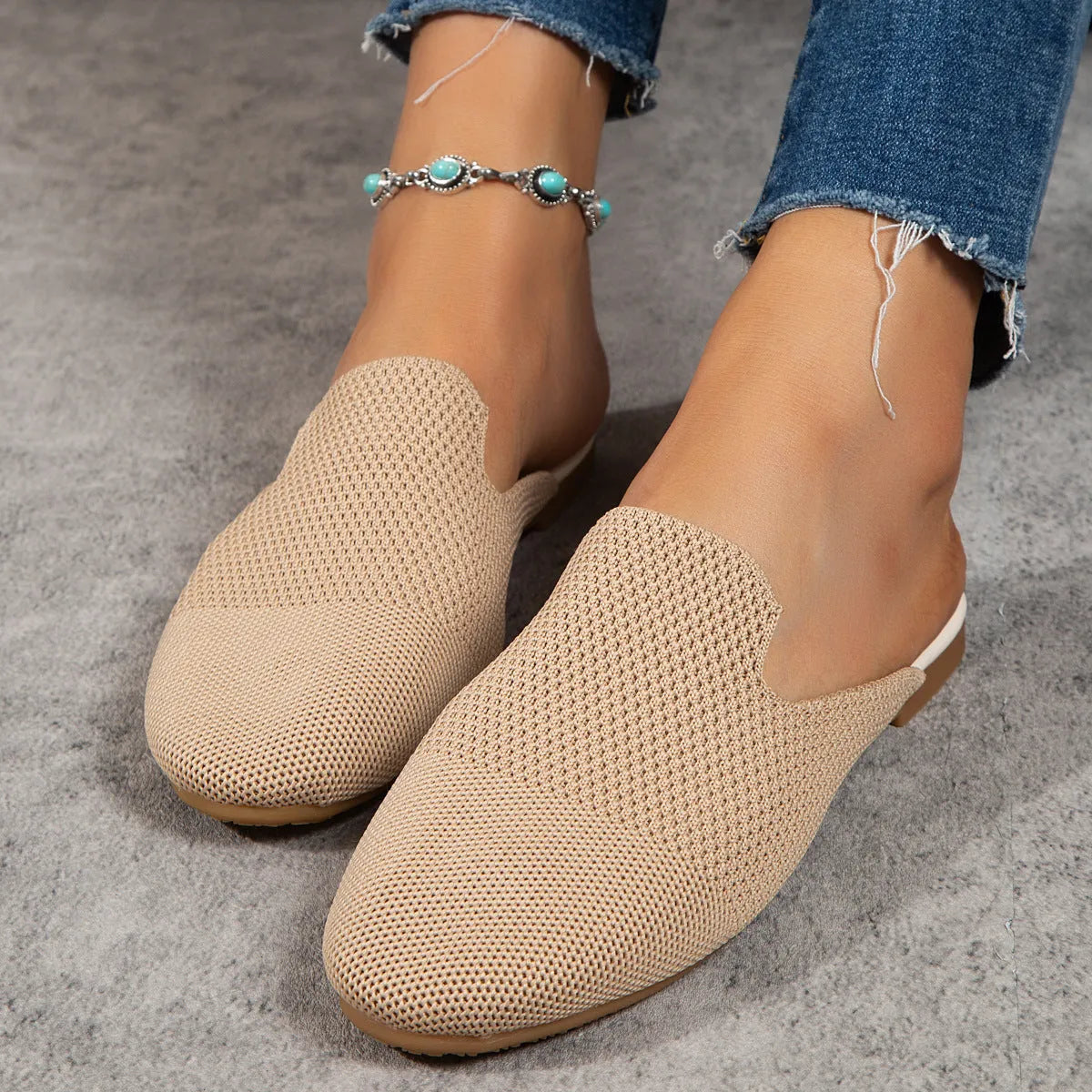 Apricot, blue, and green mesh slip-on sandals with round toe and flat rubber sole.