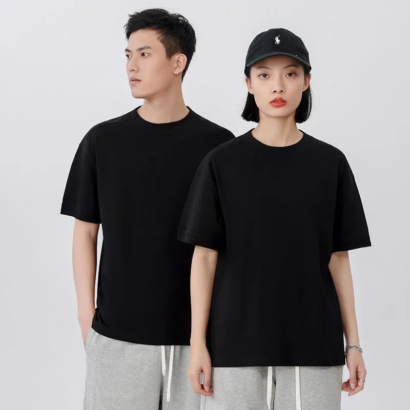 Breathable loose fit cotton short-sleeved t-shirt in a solid colour on a hanger.