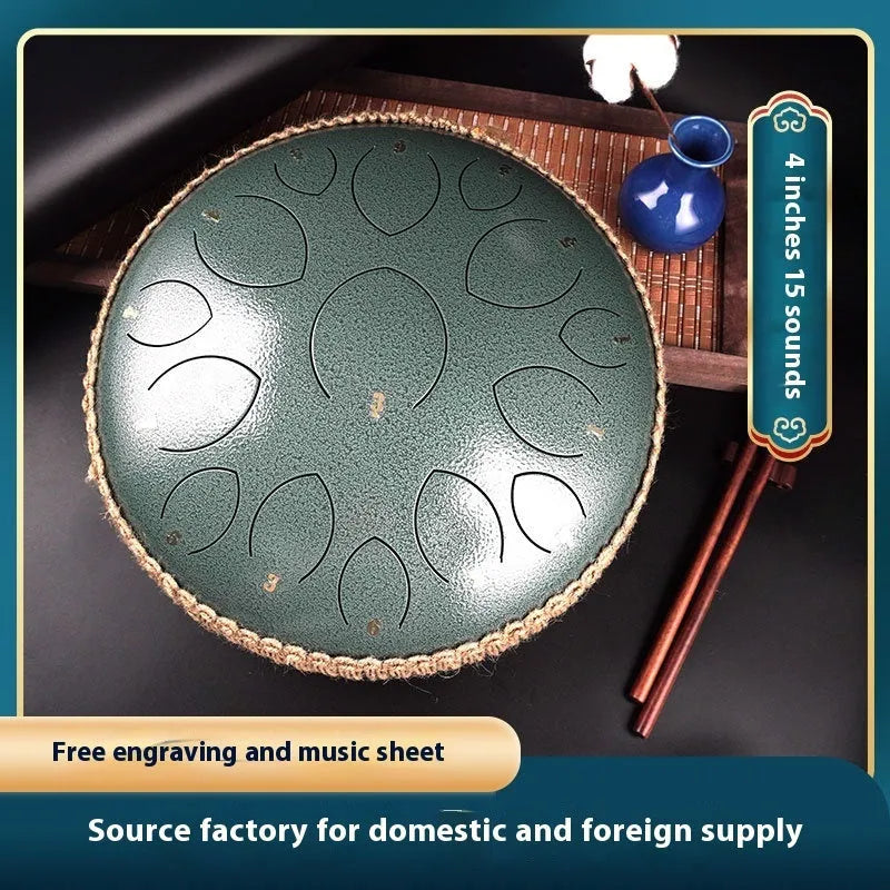 14-inch 15-tone hollow drum percussion instrument in malachite green finish on a wooden surface