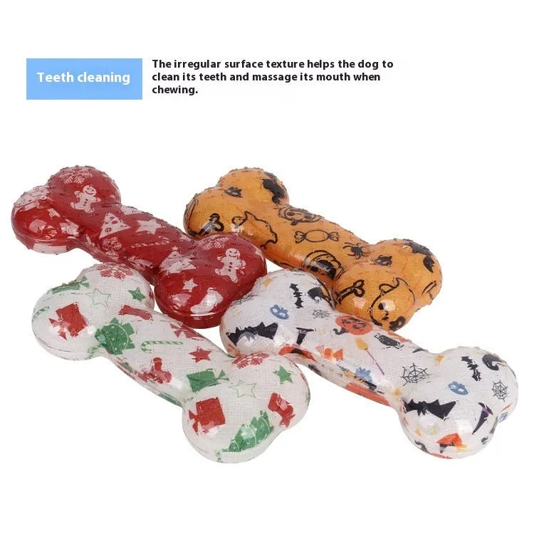 Printed bone-shaped TPR dog chew toy in seasonal colours that makes a nibbling sound