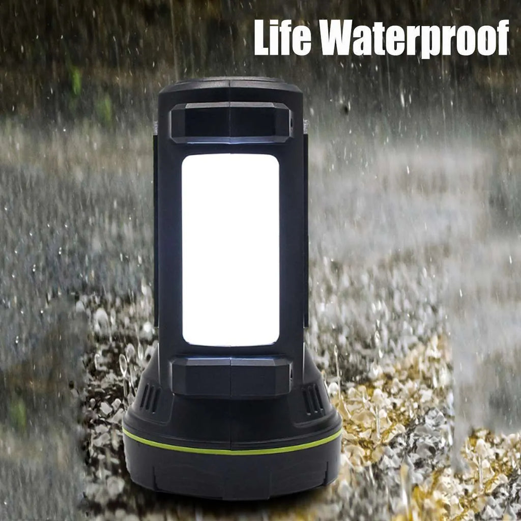 Green USB-rechargeable LED flashlight with dual-mode light function on a table.
