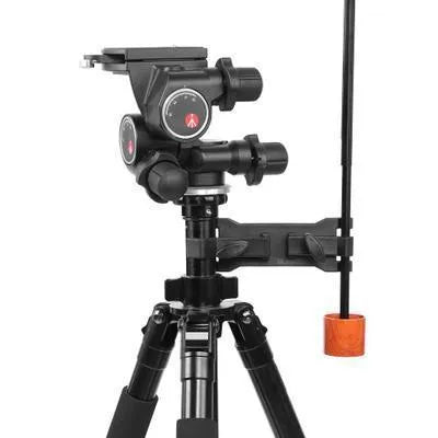 Black plastic umbrella clip attached to a tripod leg, holding a folded umbrella.
