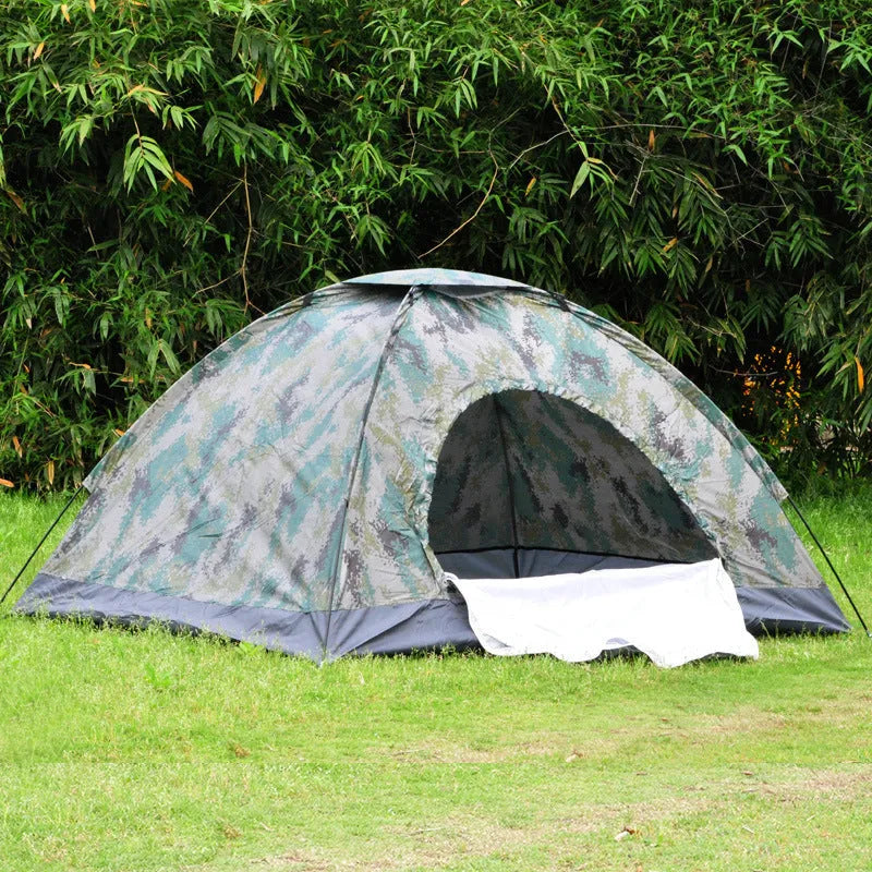 Green camouflage two-person tent with mesh windows and triangular skylight, shown erected outdoors.