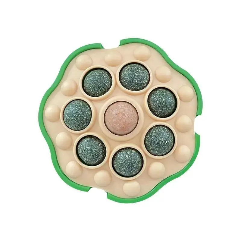 Four green lotus-shaped catnip balls mounted on wall for interactive feline play