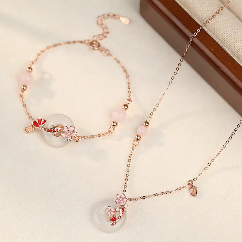 S925 sterling silver bracelet with Chinese flower designs, koi pattern and white chalcedony crystals