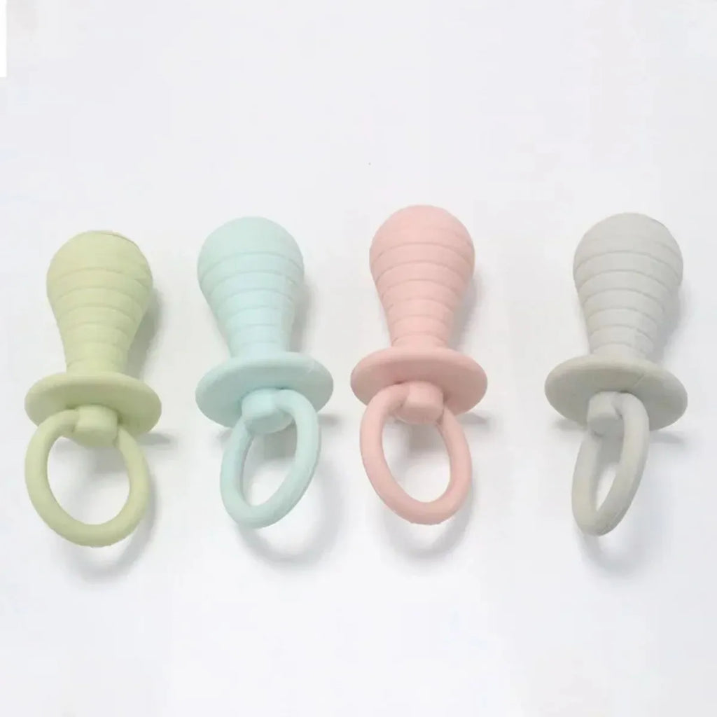 Four coloured pet pacifier chew toys with squeaker for puppies and kittens