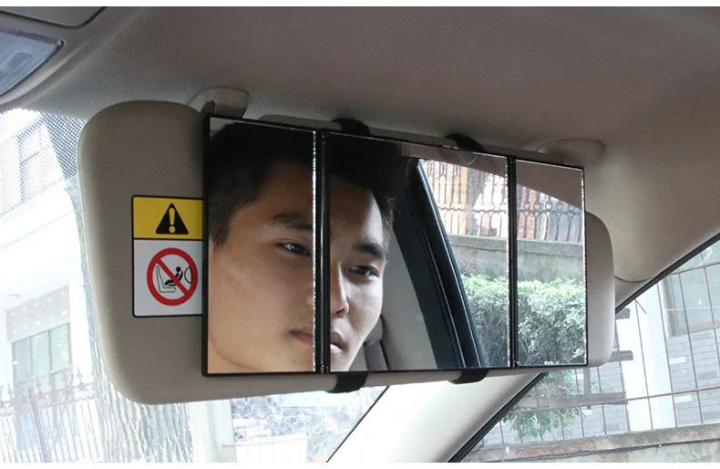 Silver folding makeup mirror shown both closed and opened, next to a car sun visor.