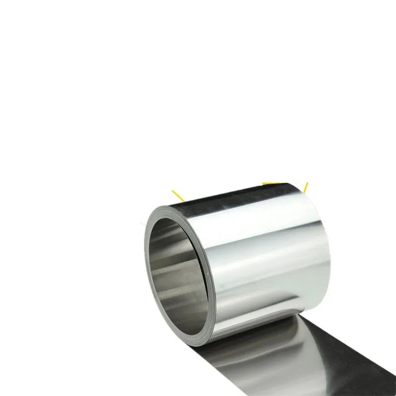 Close-up of a rolled 304 stainless steel metal strip with a leather item, showing its metallic finish and dimensions.