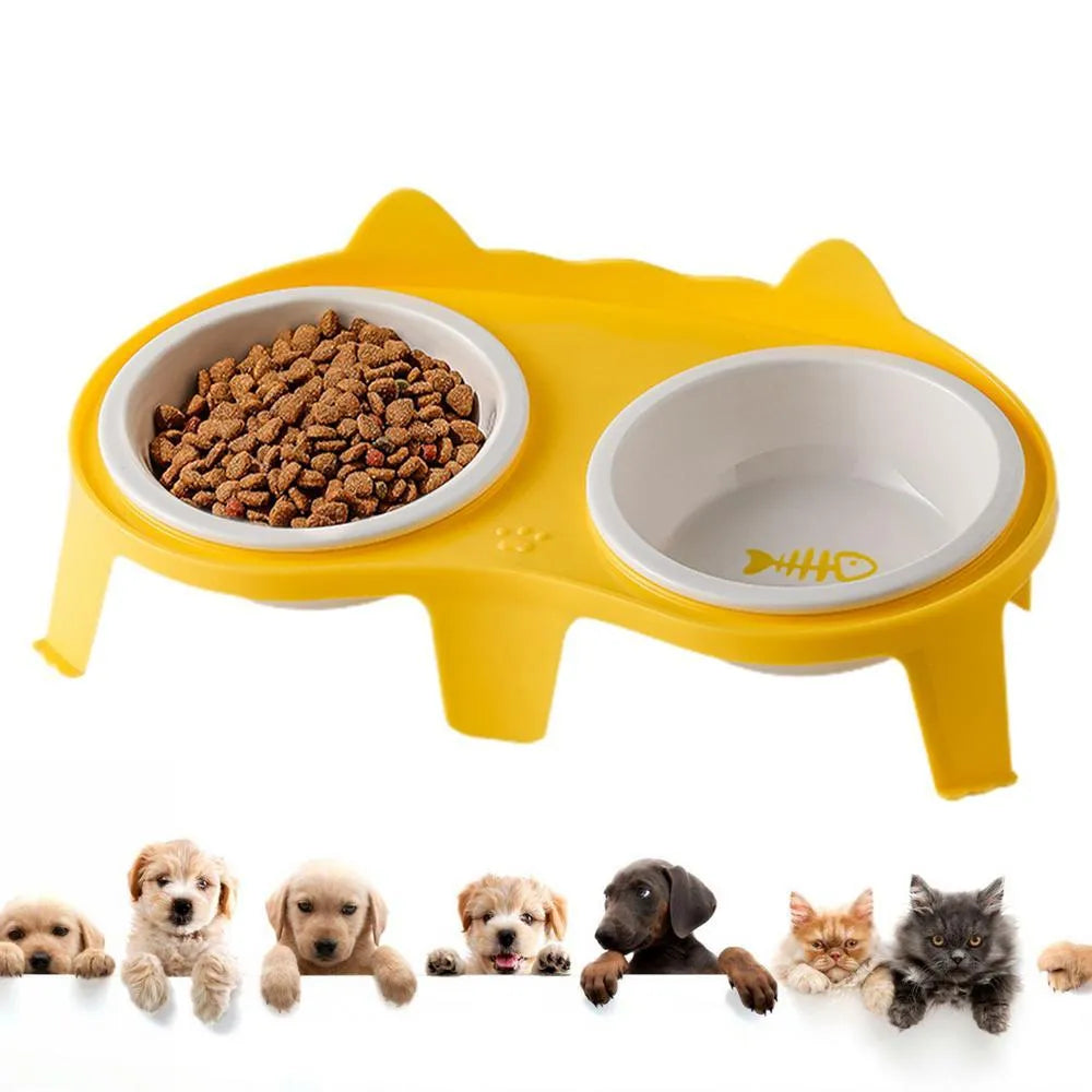 Blue ceramic cat food and water bowl set on a white stand with a hook, showing tilted feeding angle.
