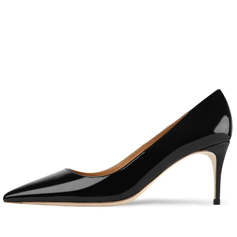 Women's black pointed-toe heeled pump with a soft sole and patent leather upper.