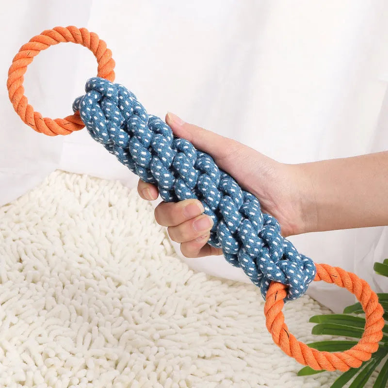 Blue braided cotton rope bone dog toy with double rings at each end for chewing and tooth cleaning