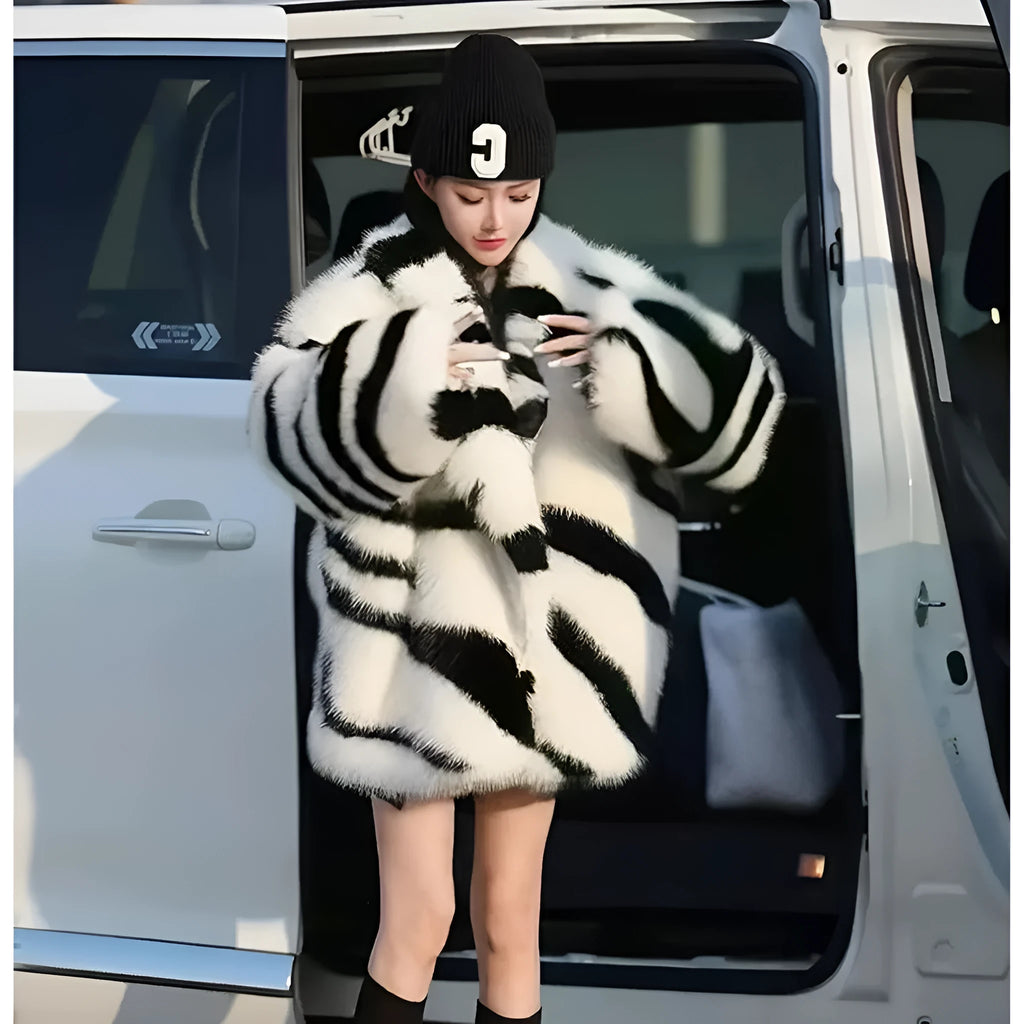 Zebra stripe women's top with fur fabric texture and large skimmer collar in street fashion style