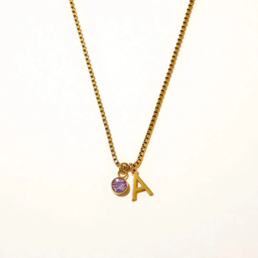 Gold and silver stainless steel birthstone first letter necklace with O-ring chain and personalised pendant