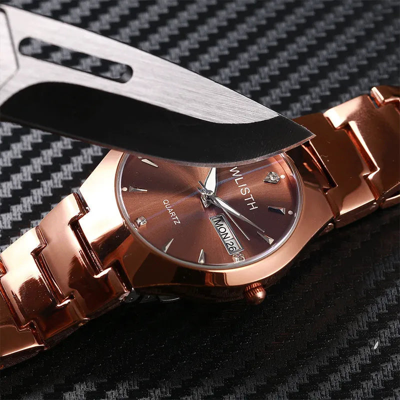 Coffee gold luminous couple watch with alloy strap and quartz movement on a light background