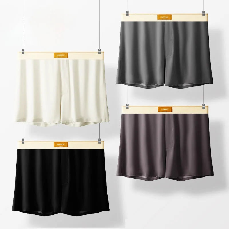 Men's solid colour loose fit ice silk underwear in a multi-pack on a grey background.